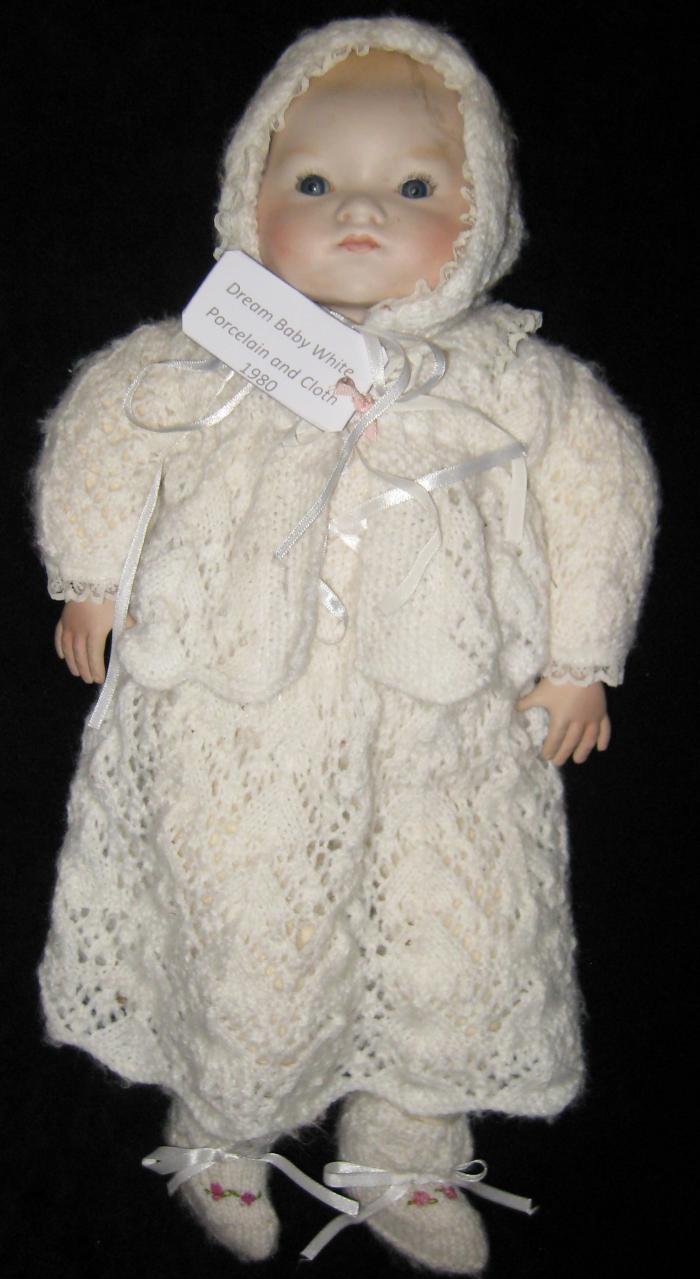 Toy. Doll. Porcelain. Cloth.